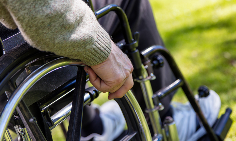 Elderly man in a wheelchair